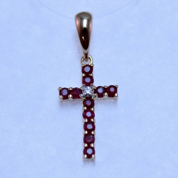 Декоративный крестик из красного золота с рубинами и бриллиантом